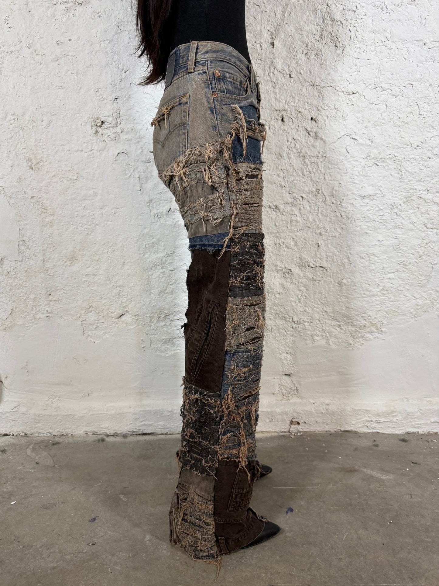 Distressed reworked denim