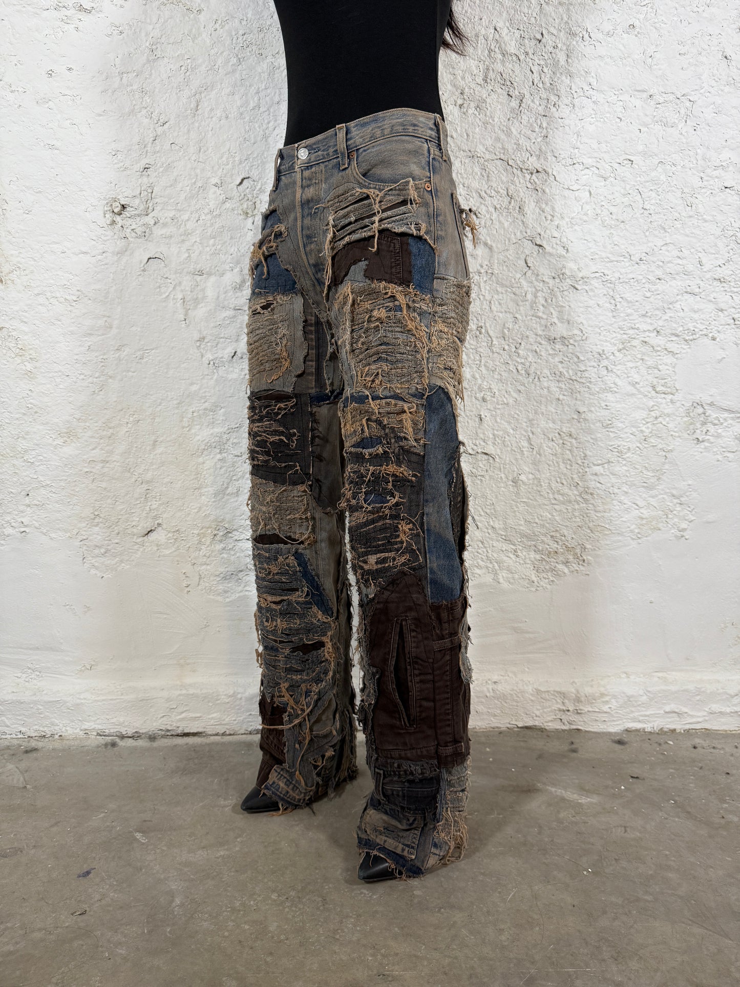 Distressed reworked denim