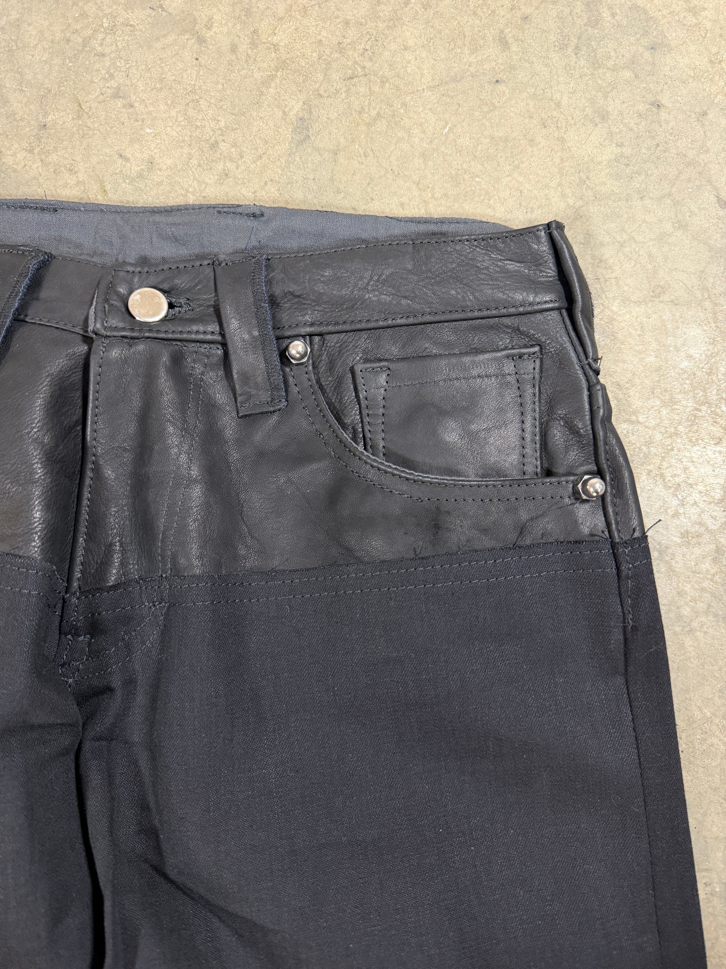 Leather dipped selvedge denim low-waist black