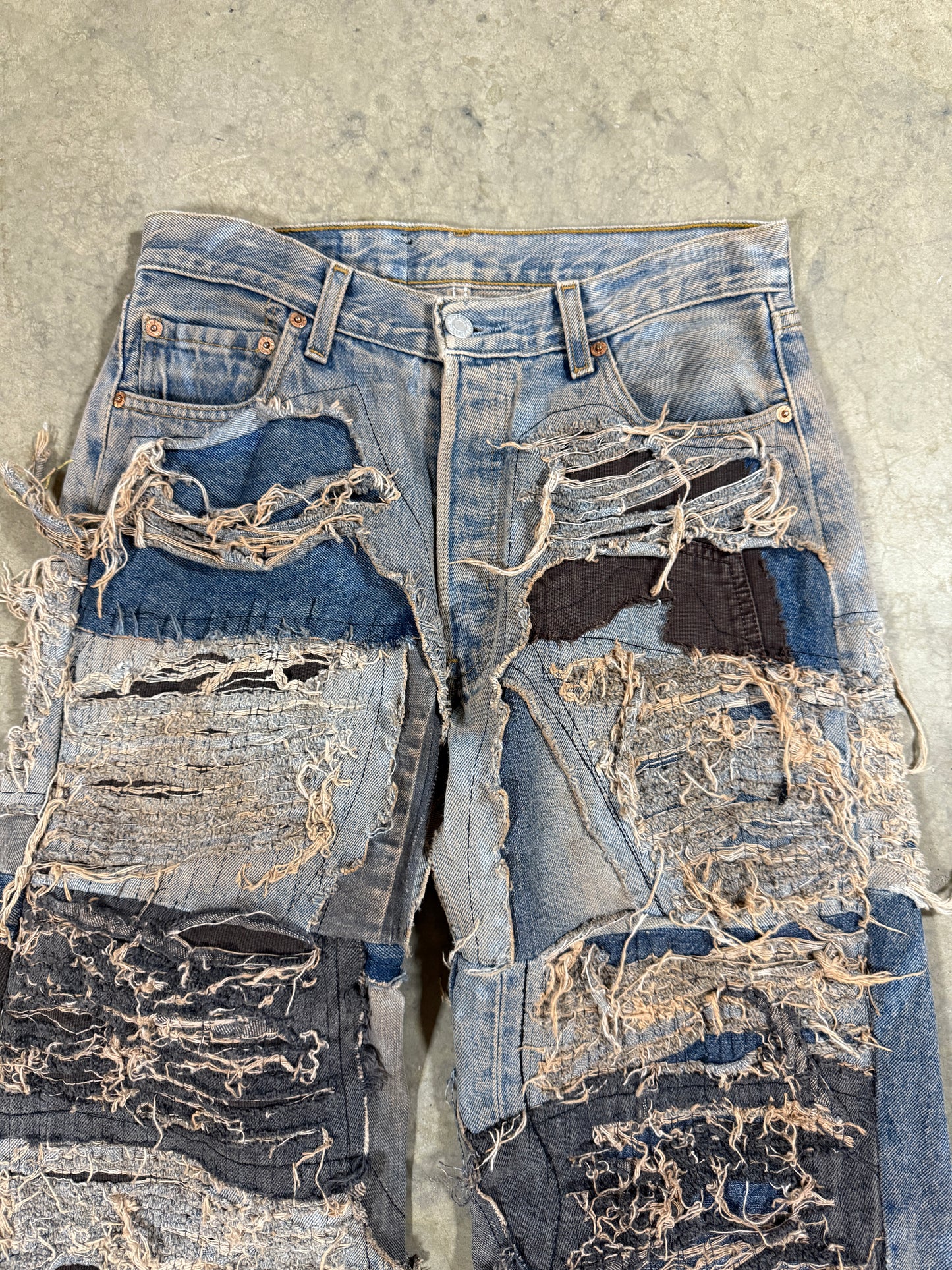 Distressed reworked denim